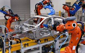 Jaguar-XE-enters-production-robot-assembly